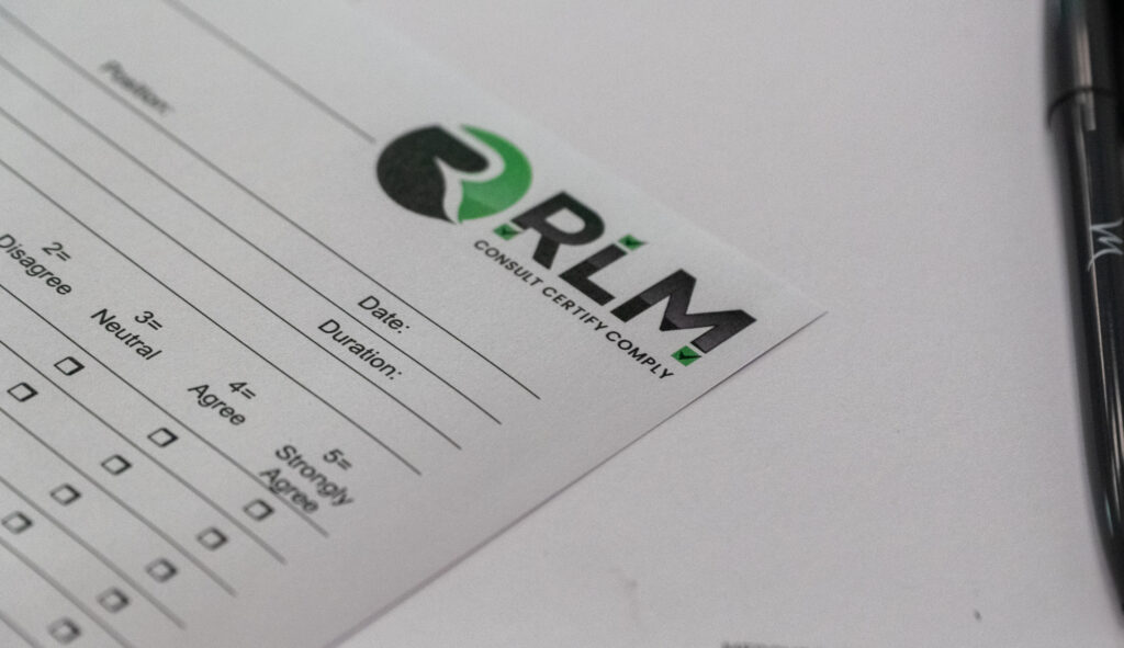 RLM Consult Certify Comply audit checklist on a desk