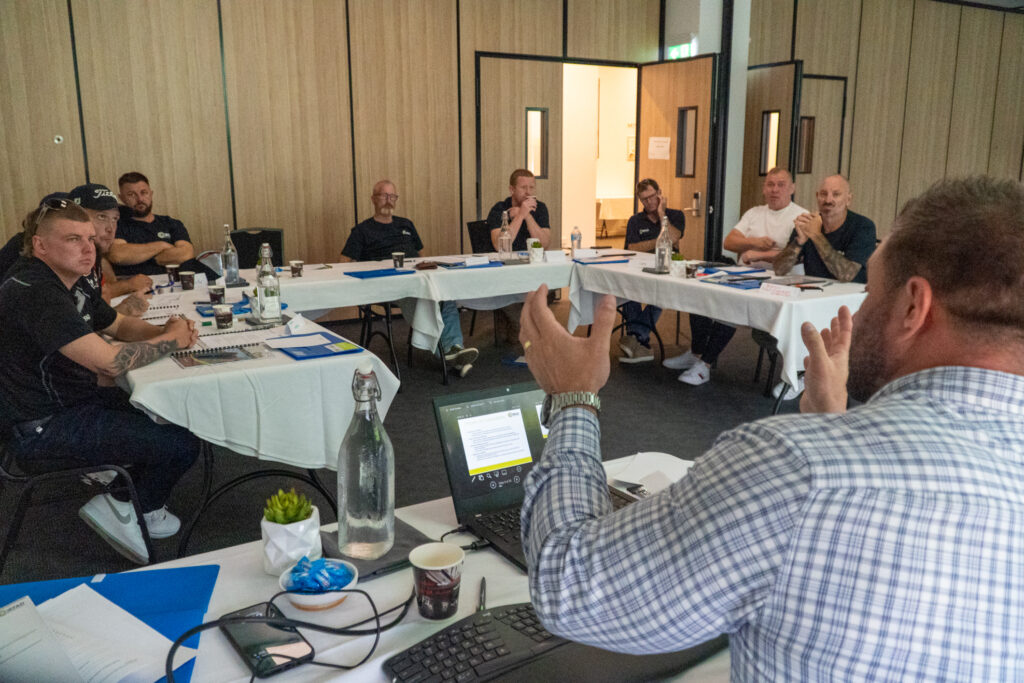 RLM consultant running a management system workshop with a client team