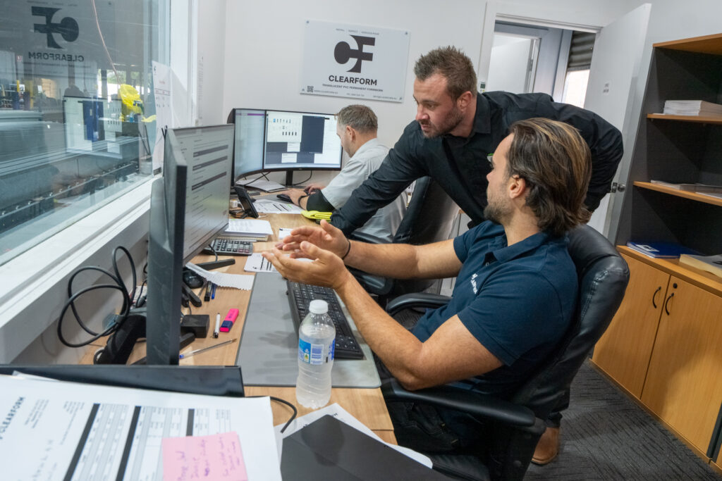 RLM rail safety consultants working through a safety management system in the office